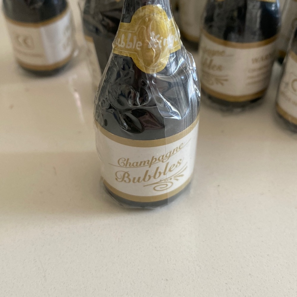 Champagne blowing bubbles